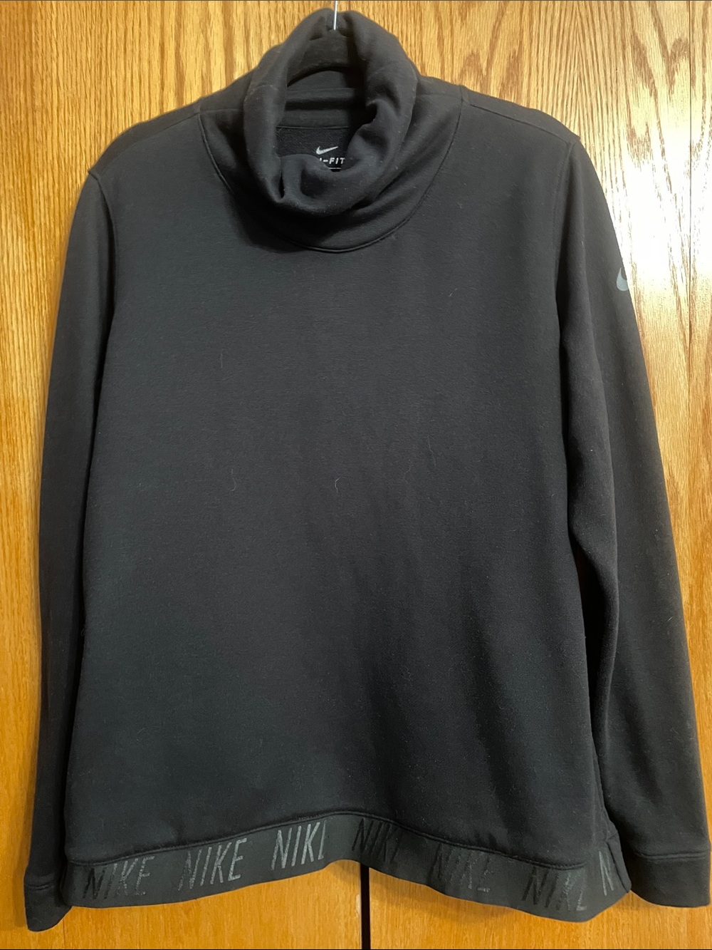 Nike Women's Black Funnel Neck Sweatshirt with Branded Hem